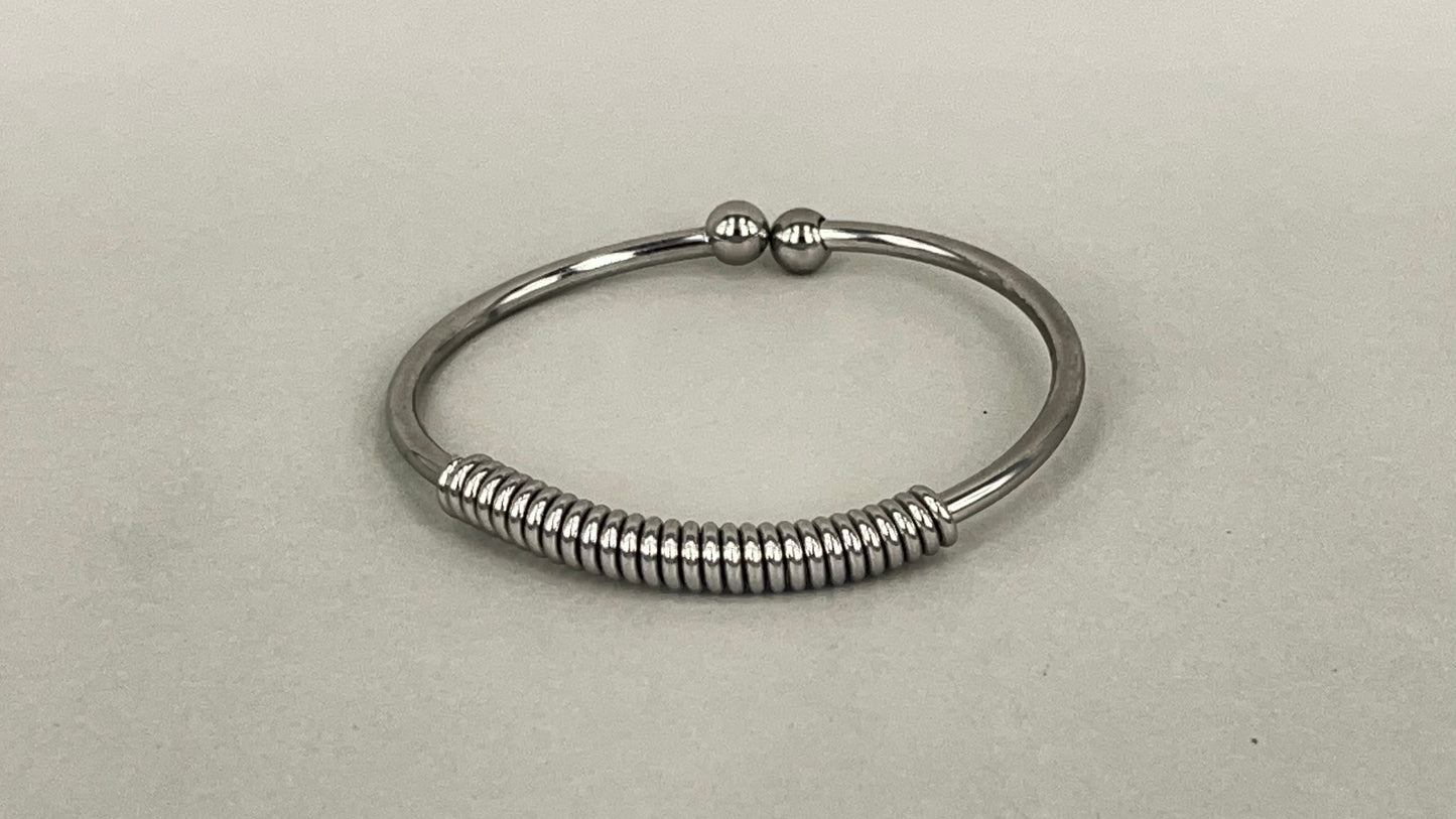 Spring bangle