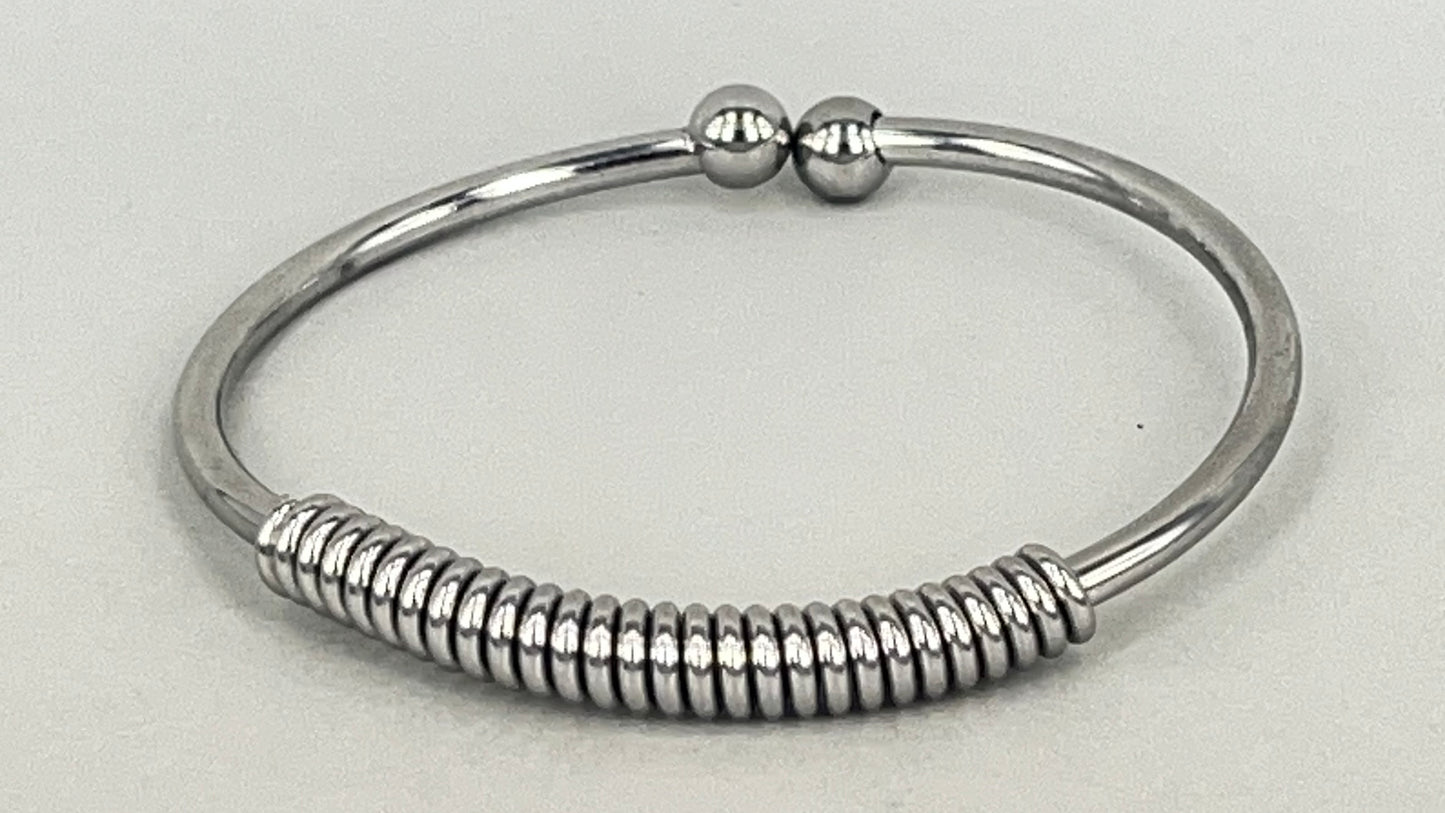 Spring bangle