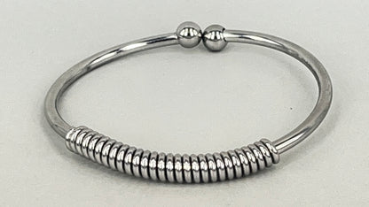 Spring bangle